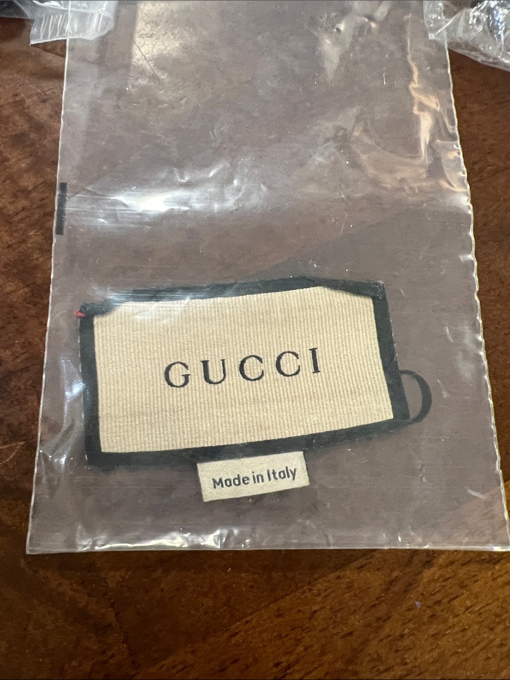 Gucci Beige Fabric Logo Patch with Black Trim (1)